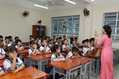 Các em học sinh lớp một, Trường Tiểu học Nguyễn Văn Trỗi, quận Tân Bình, TP.HCM. (Ảnh: Phương Vy/TTXVN)