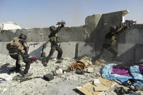 Quân đội Iraq giao tranh với các chiến binh IS tại thành phố Ramadi. (Nguồn: Reuters)