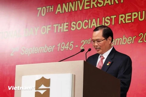 Đại sứ Việt Nam tại Singapore Nguyễn Tiến Minh đọc phát biểu khai mạc lễ kỷ niệm 70 năm Quốc khánh Việt Nam. (Ảnh: Việt Hải/Vietnam+)