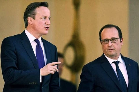 Thủ tướng Anh David Cameron và Tổng thống Pháp Francois Hollande. (Nguồn: AFP)
