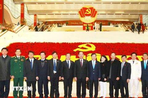 Các đại biểu Đảng bộ tỉnh Bình Dương tham dự Đại hội Đảng. (Nguồn: TTXVN)