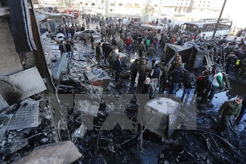 Hiện trường một vụ đánh bom ở Syria. (Nguồn: AFP/TTXVN)