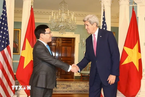 Phó Thủ tướng, Bộ trưởng Ngoại giao Phạm Bình Minh hội đàm với Ngoại trưởng Mỹ J.Kerry . (Ảnh: Thanh Tuấn/TTXVN)