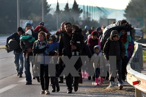 Người di cư và tị nạn. (Ảnh: AFP/TTXVN)