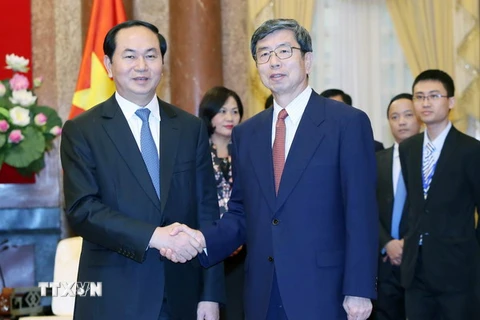 Chủ tịch nước Trần Đại Quang tiếp Chủ tịch ADB Takehiko Nakao. (Ảnh: Nhan Sáng/TTXVN) 