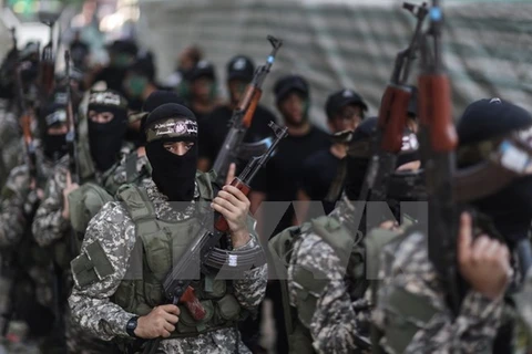 Các chiến binh Hamas tại thành phố Gaza. (Nguồn: THX/TTXVN)