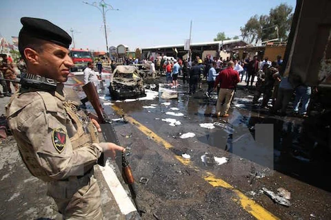 iHện trường một vụ đánh bom ở Iraq. (Nguồn: AFP/TTXVN) 