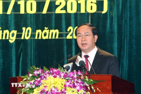 Chủ tịch nước Trần Đại Quang đọc diễn văn tại buổi lễ. (Ảnh: Nhan Sáng/TTXVN) 