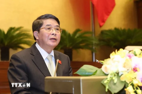 Chủ nhiệm Ủy ban Tài chính và Ngân sách của Quốc hội Nguyễn Đức Hải trình bày báo cáo tại phiên họp. (Ảnh: Phương Hoa/TTXVN)