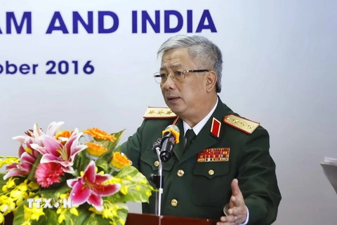 Thượng tướng Nguyễn Chí Vịnh, Thứ trưởng Bộ Quốc phòng phát biểu tại hội nghị. (Ảnh: An Đăng/TTXVN)