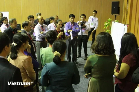 Quang cảnh thảo luận nhóm tại Hội thảo. (Ảnh: Phạm Kiên/Vietnam+)
