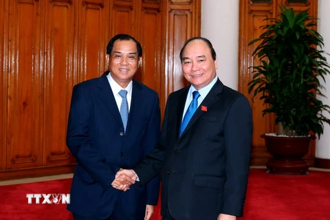 Thủ tướng Nguyễn Xuân Phúc tiếp Bộ trưởng Kế hoạch và Đầu tư Lào Su Phan Keo My Xay. (Ảnh: Thống Nhất/TTXVN) 