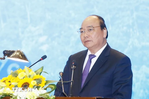 Thủ tướng Nguyễn Xuân Phúc phát biểu tại Hội nghị xúc tiến đầu tư tỉnh Vĩnh Phúc 2016. (Ảnh: Thống Nhất/TTXVN) 