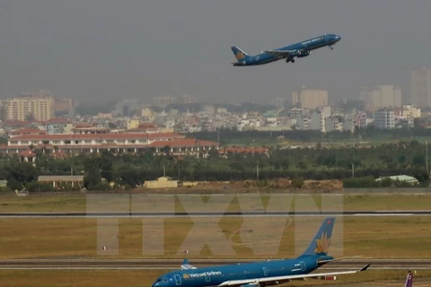 Các hãng hàng không Việt Nam tại sân bay Tân Sơn Nhất. (Ảnh: Hoàng Hải/TTXVN) 