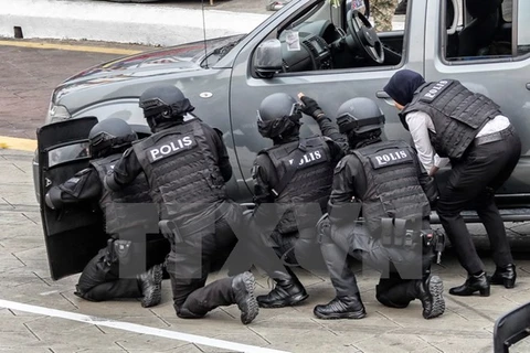 Cảnh sát chống khủng bố Malaysia luyện tập nghiệp vụ tại Kuala Lumpur. (Nguồn: EPA/TTXVN)