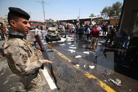 Hiện trường một vụ đánh bom ở Iraq. (Nguồn: AFP/TTXVN)