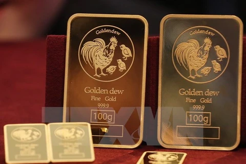 Vàng miếng được bày tại cửa hàng Lotte ở Seoul, Hàn Quốc. (Nguồn: Yonhap/TTXVN)