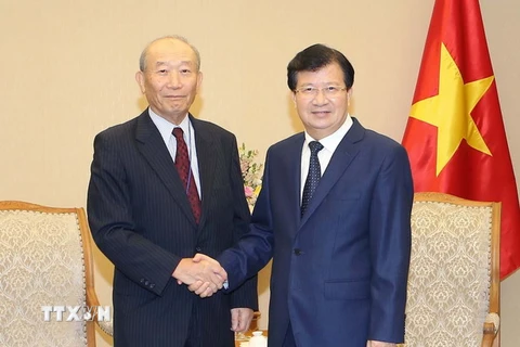 Phó Thủ tướng Trịnh Đình Dũng tiếp Phó Chủ tịch Hội đồng thúc đẩy ngoại giao nhân dân Nhật Bản (FEC) Yoshihiko Nakagaki. (Ảnh: Doãn Tấn/TTXVN)