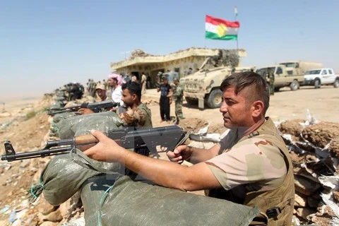 Các chiến binh người Kurd tại khu vực thị trấn Bashiqa. (Nguồn: AFP/TTXVN)