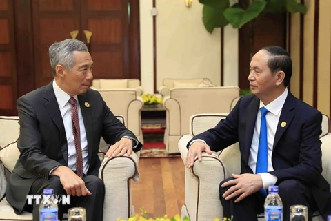 Chủ tịch nước Trần Đại Quang và Thủ tướng Singapore Lý Hiển Long. (Ảnh: TTXVN)