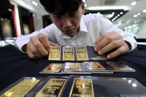 Tại sàn giao dịch vàng Hàn Quốc ở Seoul. (Nguồn: Yonhap/TTXVN)