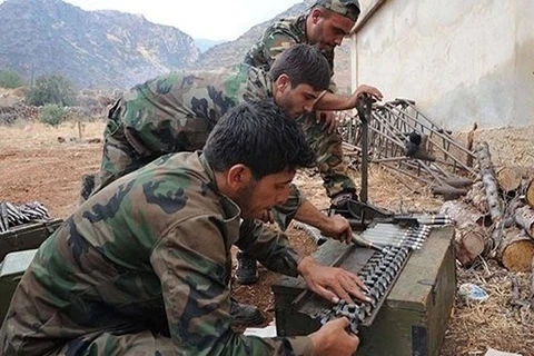 Các tay súng Hezbollah tại một cứ điểm quân sự ở khu vực biên giới Liban-Syria. (Nguồn: alalam.ir)