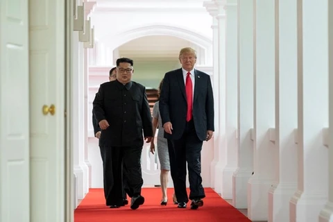 Tổng thống Mỹ Donald Trump (phải) và Nhà lãnh đạo Triều Tiên Kim Jong-un. (Nguồn: Twitter)