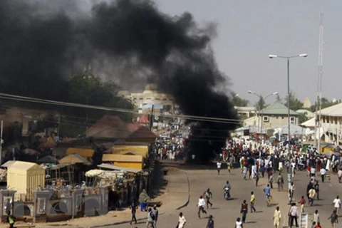Hiện trường một vụ đánh bom liều chết ở Nigeria. (Nguồn: The Independent/TTXVN)