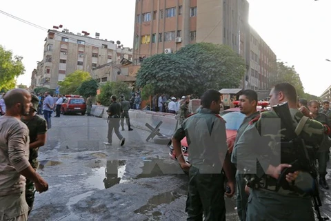 Hiện trường một vụ đánh bom liều chết ở Damascus, Syria. (Nguồn: AFP/TTXVN)