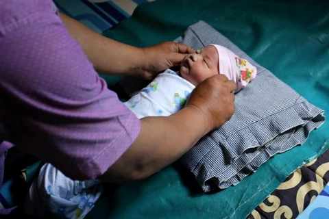 Bé Abidah Asian Games. (Nguồn: AFP/TTXVN)