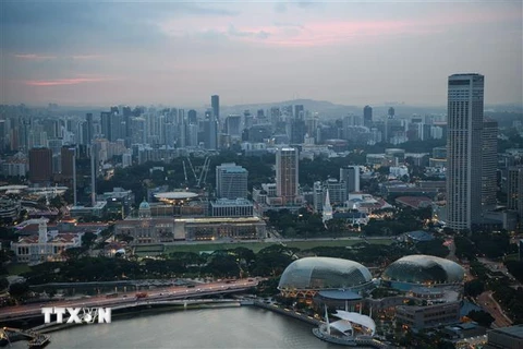Các tòa nhà thương mại ở Singapore. (Ảnh: AFP/ TTXVN)