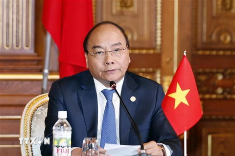 Thủ tướng Nguyễn Xuân Phúc phát biểu tại cuộc họp báo chung cùng các trưởng đoàn, sau khi kết thúc hội nghị. (Ảnh: Thống Nhất/TTXVN)