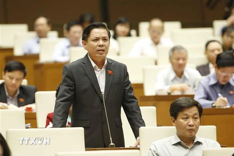 Bộ trưởng Bộ Giao thông vận tải Nguyễn Văn Thể phát biểu giải trình, làm rõ một số vấn đề đại biểu Quốc hội nêu. (Ảnh: Doãn Tấn/TTXVN)