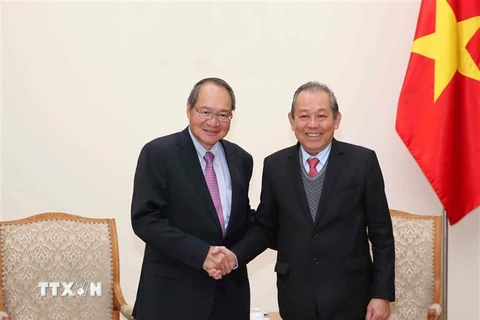 Phó Thủ tướng Thường trực Trương Hòa Bình tiếp ông Lucien Wong, Tổng Chưởng lý Cộng hòa Singapore. (Ảnh: Văn Điệp/TTXVN)