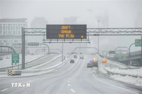 Băng tuyết phủ trắng xóa tại Boston, Massachusetts, Mỹ, ngày 20/1. (Ảnh: AFP/TTXVN)