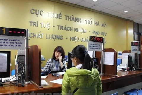 Hoạt động tại Cục Thuế Hà Nội. (Nguồn: Vietnam+)