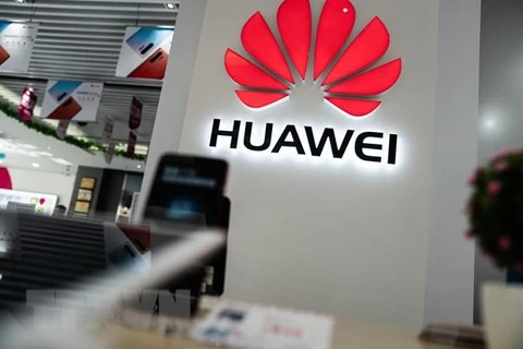 Biểu tượng Huawei tại một cửa hàng ở Bắc Kinh, Trung Quốc, ngày 20/5. (Nguồn: AFP/ TTXVN)