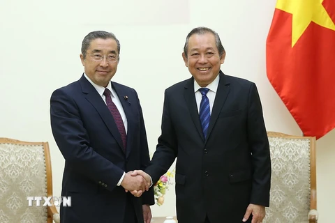 Phó Thủ tướng Thường trực Trương Hòa Bình tiếp ông Junji Suzuki. (Ảnh: Dương Giang/TTXVN)