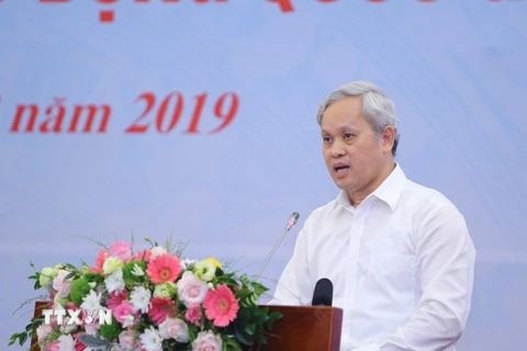 Tổng Cục Trưởng Tổng cục Thống kê Nguyễn Bích Lâm báo cáo thống kê về năng suất lao động của Việt Nam. (Ảnh: Danh Lam/TTXVN)