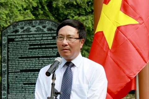 Phó Thủ tướng, Bộ trưởng Ngoại giao Phạm Bình Minh phát biểu tại lễ kỷ niệm 70 năm Ngày thành lập ngành ngoại giao. (Ảnh: Văn Tý/TTXVN)