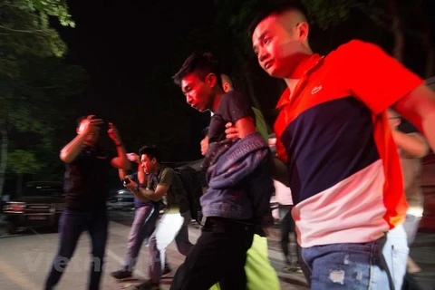 Đêm 30/9, hai nghi phạm trong vụ giết nam sinh 18 tuối lái Grab là Đinh Văn Giáp và Đinh Văn Trường đã được di lý về Hà Nội để đấu tranh làm rõ hành vi phạm tội. (Ảnh: PV/Vietnam+) 