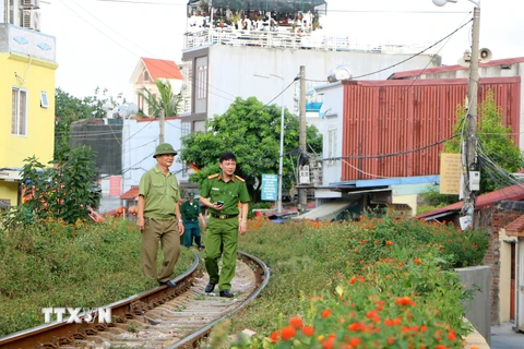 Công an và Hội Cựu Chiến binh phường Cát Dài, quận Lê Chân là lực lượng chủ lực đem lại sự bình yên cho người dân trong khu vực. (Ảnh: Minh Thu/TTXVN)