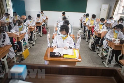 Học sinh tại một trường học ở Vũ Hán, tỉnh Hồ Bắc, Trung Quốc. (Nguồn: THX/TTXVN)