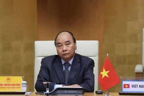Thủ tướng Nguyễn Xuân Phúc tham dự Hội nghị thượng đỉnh trực tuyến G20 về ứng phó dịch COVID-19 ngày 26/3/2020. (Ảnh: Thống Nhất/TTXVN)