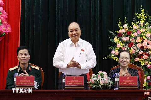 Thủ tướng Nguyễn Xuân Phúc phát biểu tại buổi tiếp xúc cử tri huyện An Lão. (Ảnh: Thống Nhất/TTXVN)