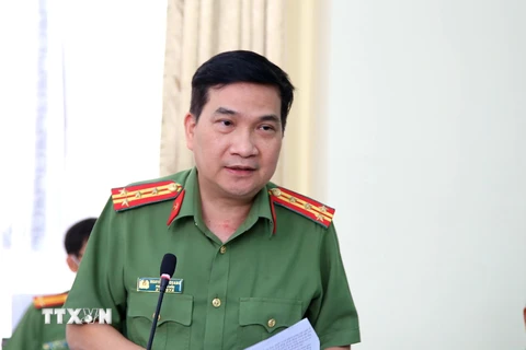 Đại tá Nguyễn Sỹ Quang, Phó Giám đốc Công an Thành phố Hồ Chí Minh trả lời câu hỏi của các cơ quan báo chí. (Ảnh: Thành Chung/TTXVN)