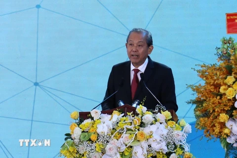 Phó Thủ tướng Thường trực Chính phủ Trương Hòa Bình phát biểu tại hội nghị xúc tiến đầu tư tỉnh Bình Phước. (Ảnh: Sỹ Tuyên/TTXVN)