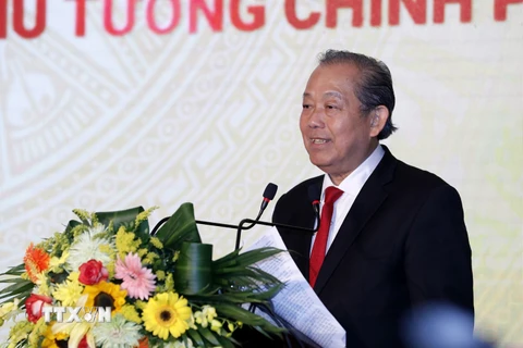 Phó Thủ tướng Thường trực Chính phủ Trương Hòa Binh phát biểu tại lễ kỷ niệm. (Ảnh: Dương Giang/TTXVN)