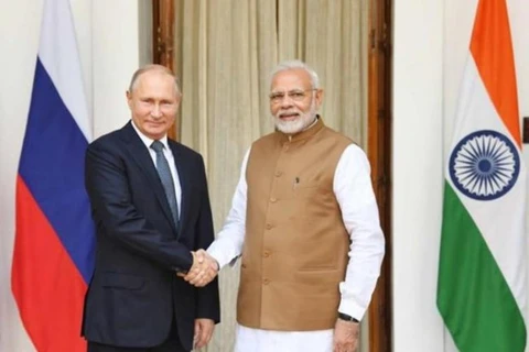 Tổng thống Vladimir Putin và Thủ tướng Narendra Modi. (Nguồn: indiablooms.com)
