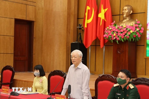 Tổng Bí thư Nguyễn Phú Trọng, Bí thư Quân ủy Trung ương trình bày Chương trình hành động. (Ảnh: Trí Dũng/TTXVN)
